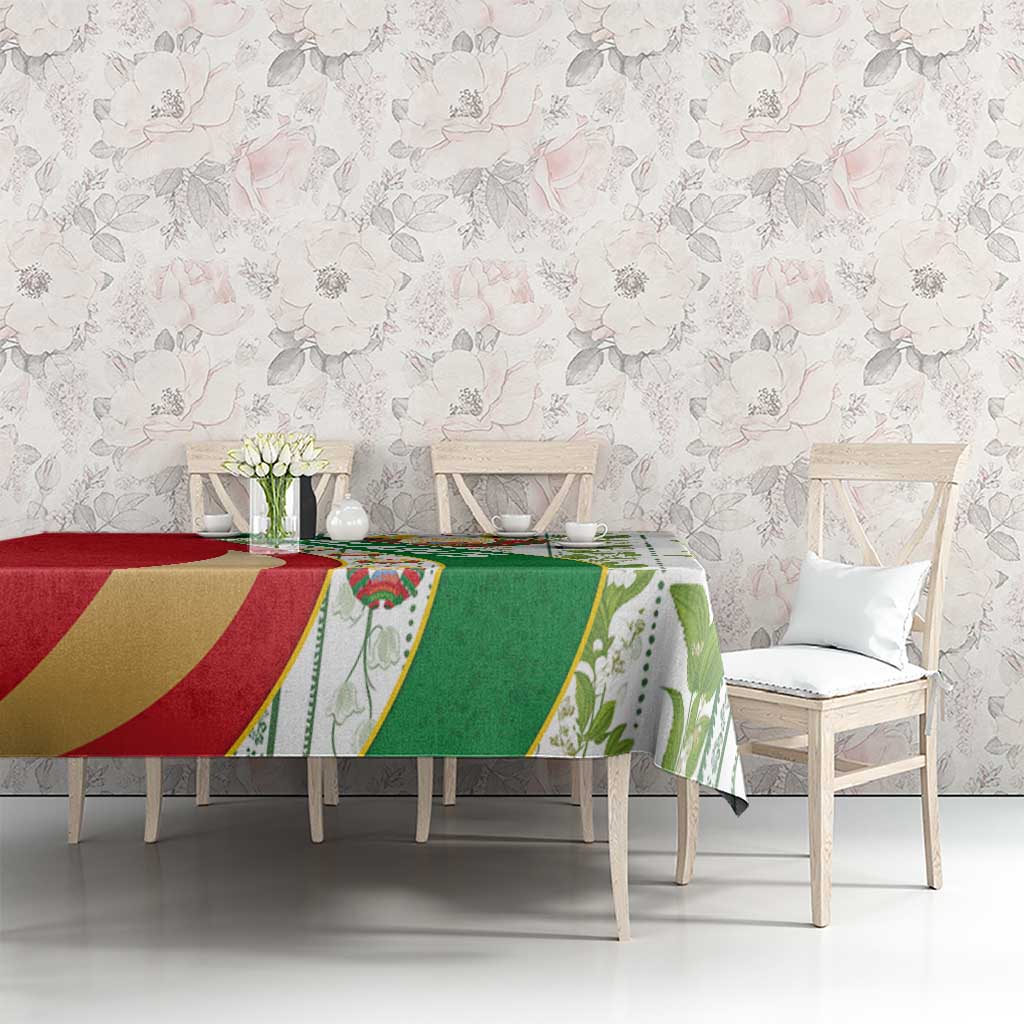 Multicolor folk tablecloth with Belarus emblem, green leaf border, and red green gold panels