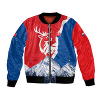 Red and blue bomber jacket with deer, mountains, and zip front; ribbed black cuffs