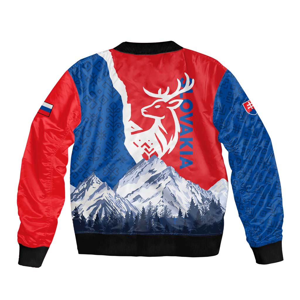 Red and blue bomber jacket with deer crest and mountain print; black ribbed hem and cuffs
