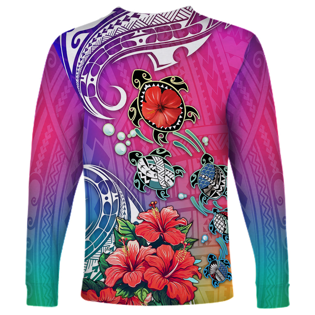 Unisex long-sleeve shirt, centered turtle and hibiscus graphic on pink-to-teal gradient
