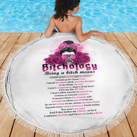 Round beach blanket with skull roses and pink "Being a bitch means" text, fringed edge