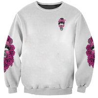 Light gray crewneck sweatshirt with small pink character and rose graphics on sleeves