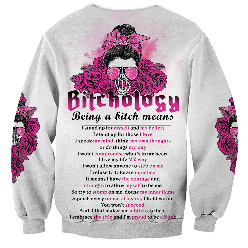 Light gray graphic sweatshirt, pink floral skull back print with bold text and roses