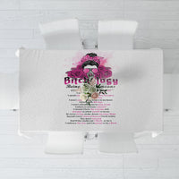 Gray tablecloth with central magenta-and-purple graphic and text design, top view