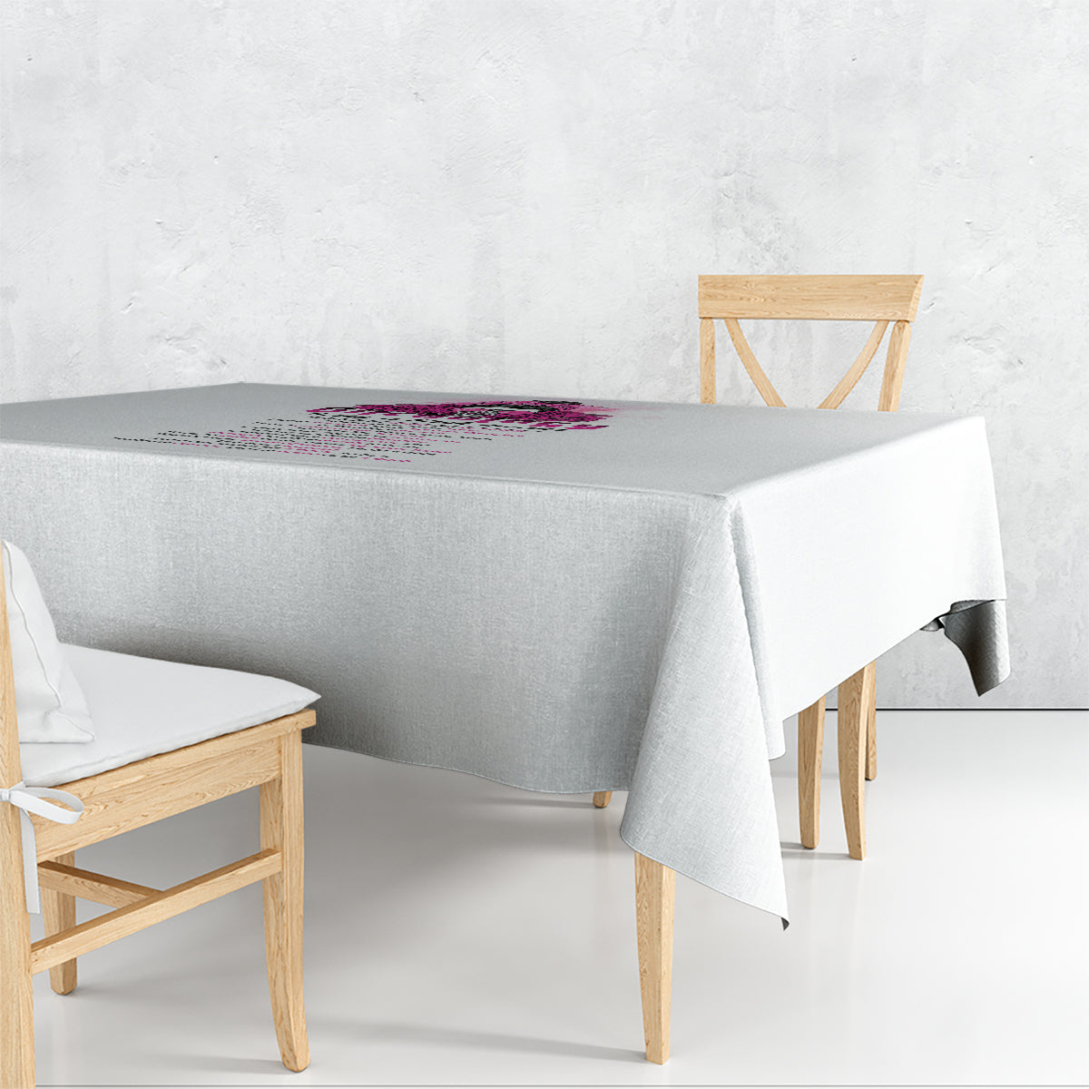 Rectangular gray tablecloth with multicolor printed message across the center