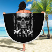 Round black beach blanket featuring skull artwork and 'That'll Be Fun' text, fringed border