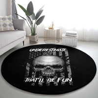 Round black carpet with centered skull design and 'THAT'LL BE FUN' text arc