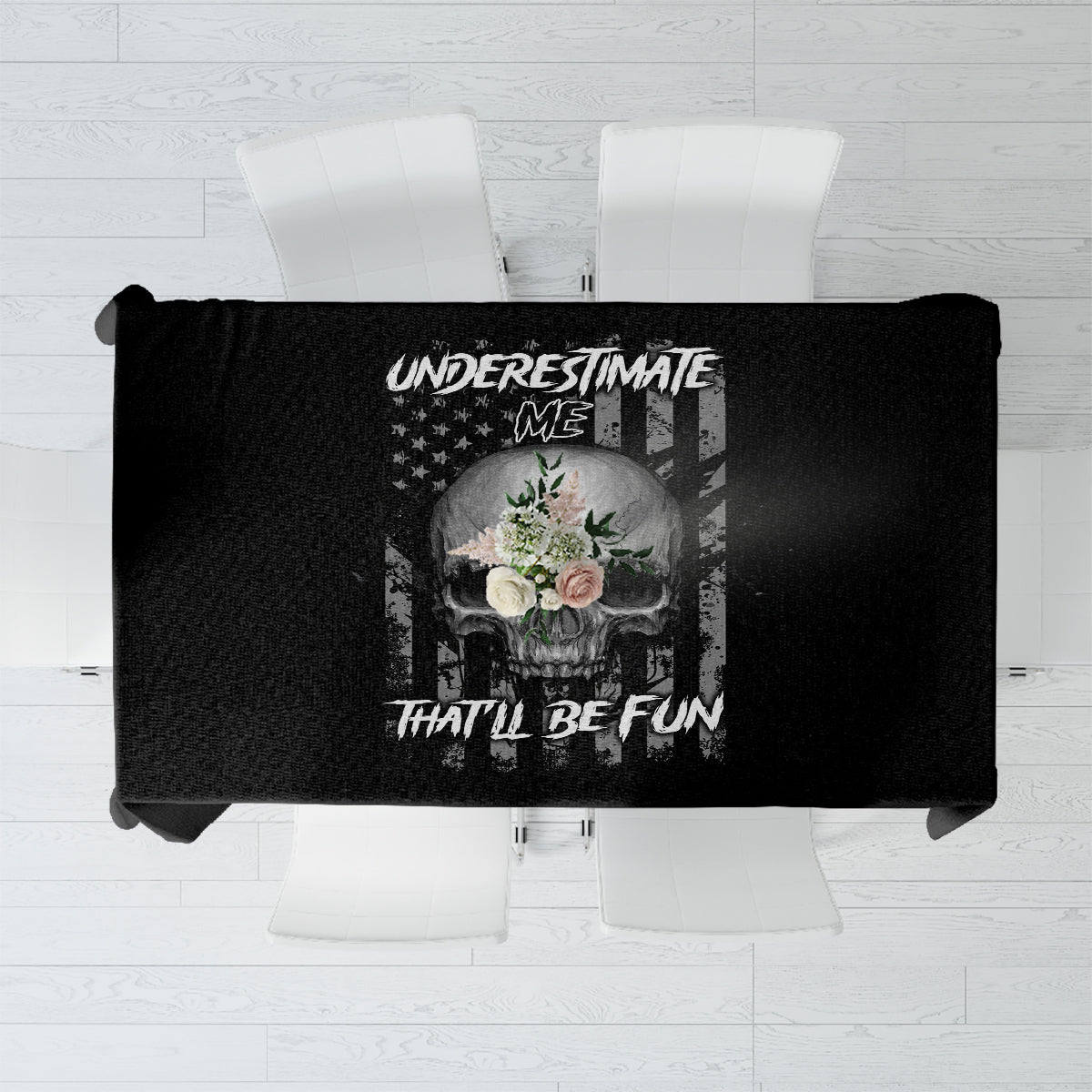 Black tablecloth with skull and 'Underestimate Me' text