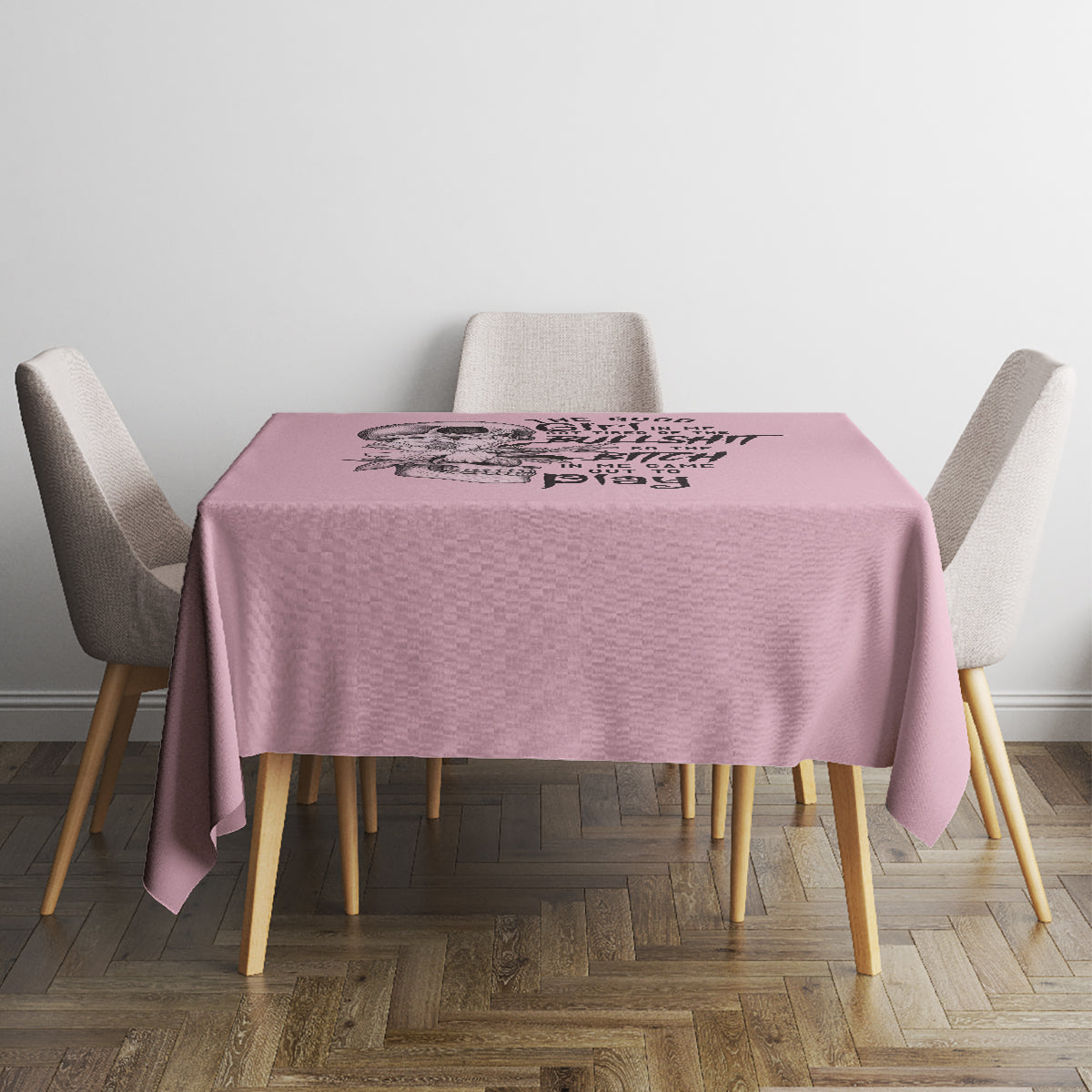 Mauve tablecloth with skull graphic, corner drop visible on dining table