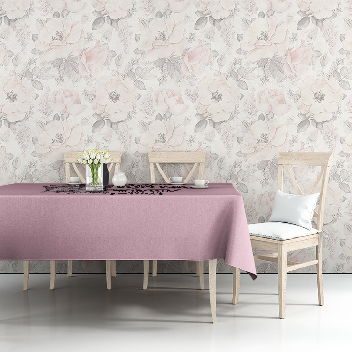 Mauve tablecloth with skull and text motif, spread across tabletop