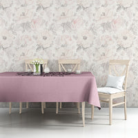 Mauve tablecloth with skull and text motif, spread across tabletop