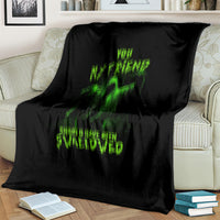 Black Halloween throw blanket with neon green skull and “Swallowed” text
