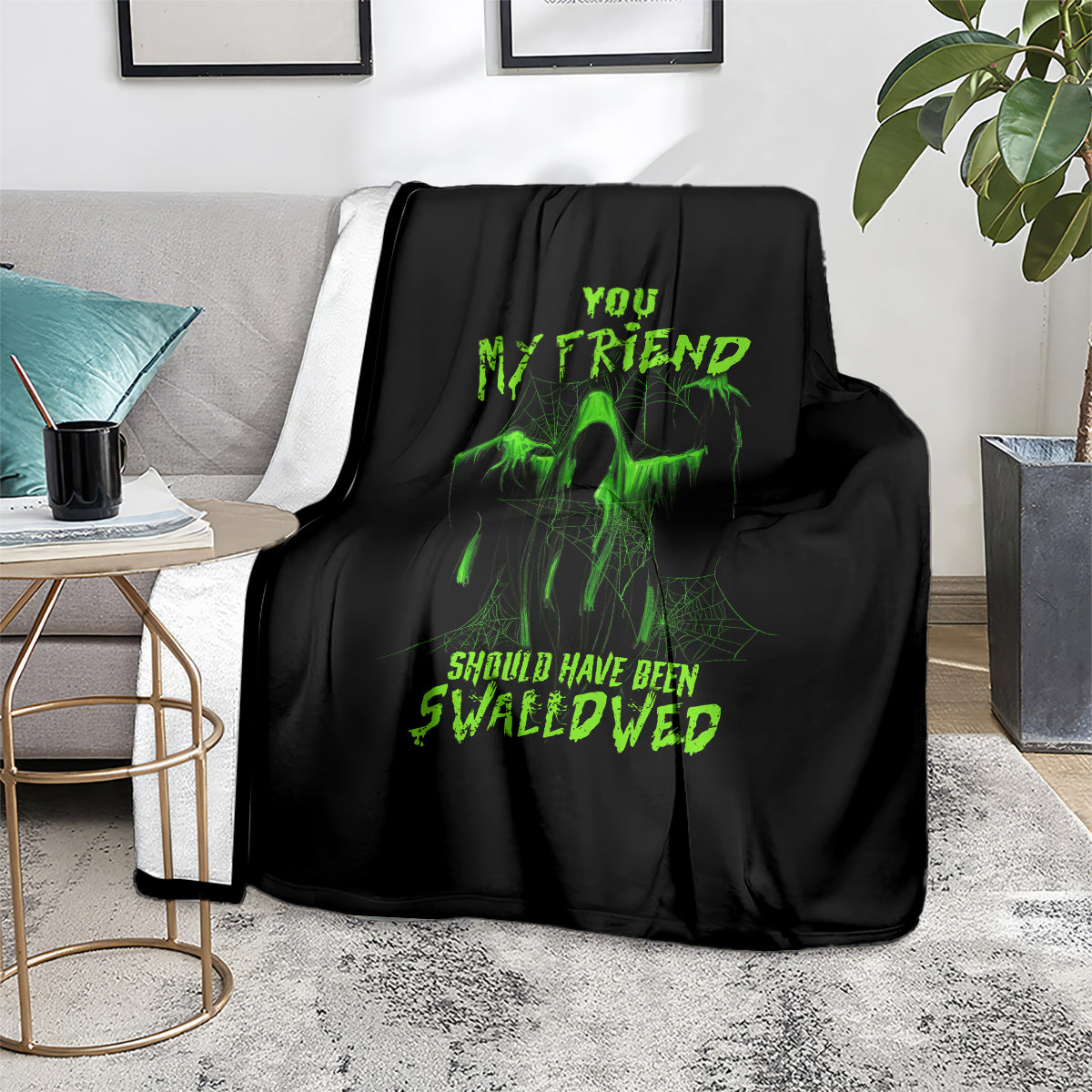 Black Halloween throw blanket with green skull figure and “You My Friend” text