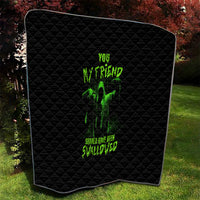 Black Halloween quilt with neon green monster figure and text, quilted diamond stitching