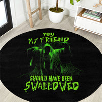 Black round Halloween rug with centered green alien skull and glowing text graphic