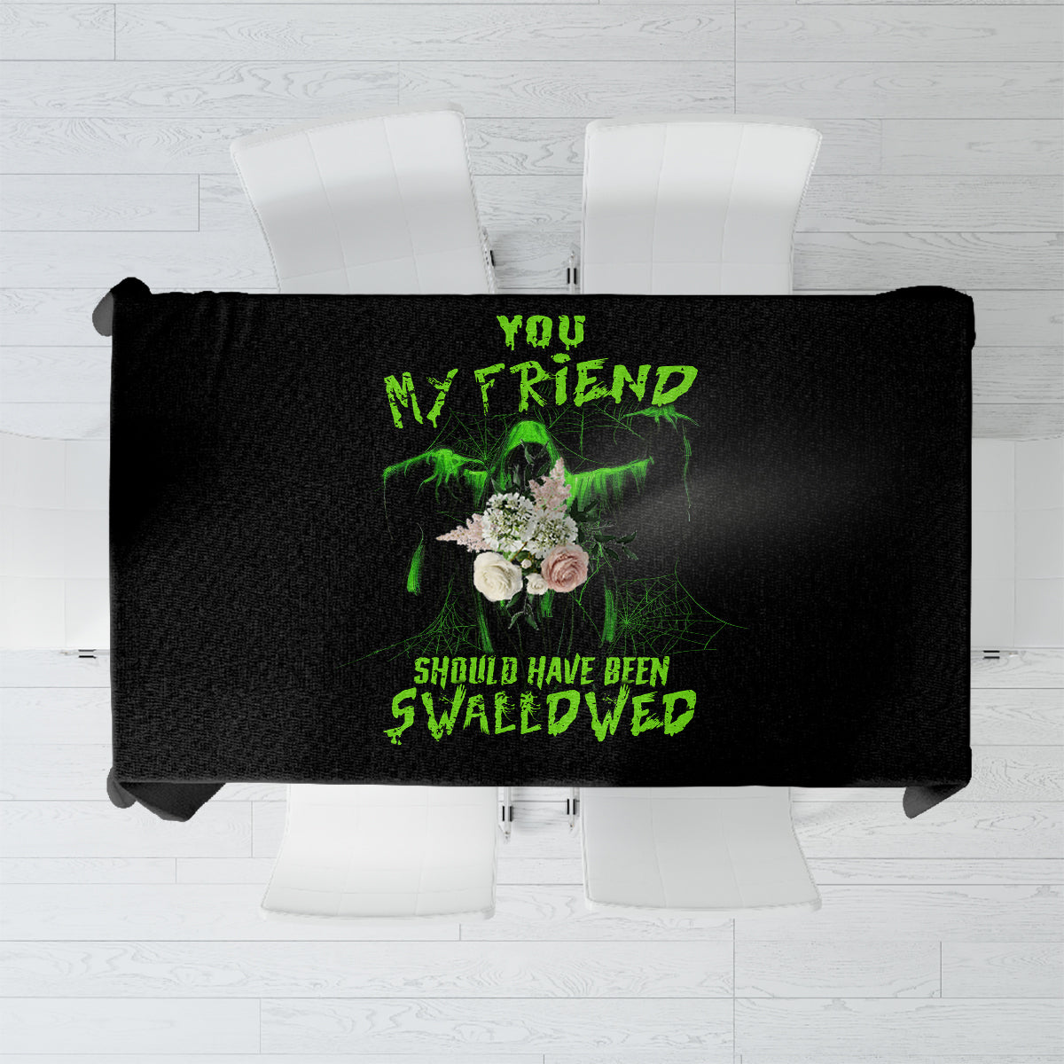 Black Halloween tablecloth with centered green neon typography and skull bouquet graphic