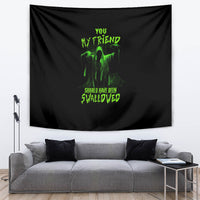 Black Halloween tapestry with neon green ghostly figure and 'swallowed' quote