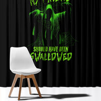 Black Halloween window curtain with neon green monster text graphic