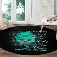 Round black rug with teal skull graphic centered and white slogan text