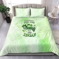 Green tie-dye bedding set with skull and shamrock graphic and two matching pillowcases