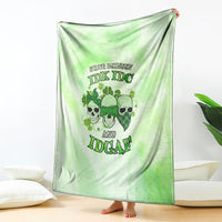 St. Patrick's Day green blanket hanging display, skull faces and shamrock text graphic