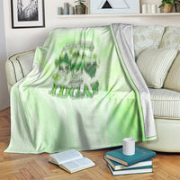 St. Patrick's Day green blanket with skull graphic and text, gray edging visible