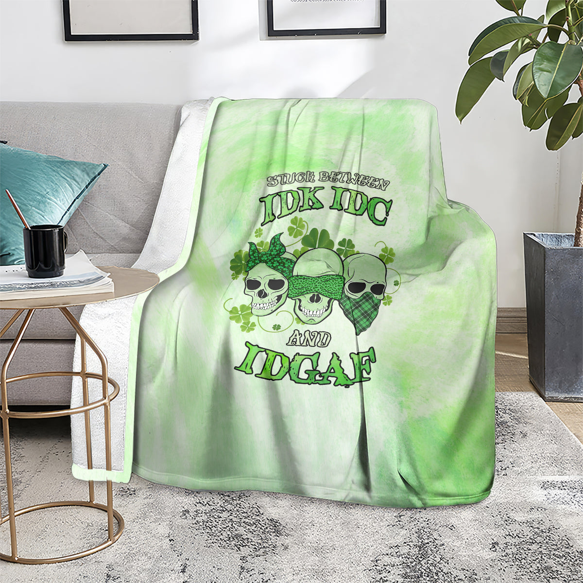 St. Patrick's Day green blanket with skull faces and stylized text graphic, on seat