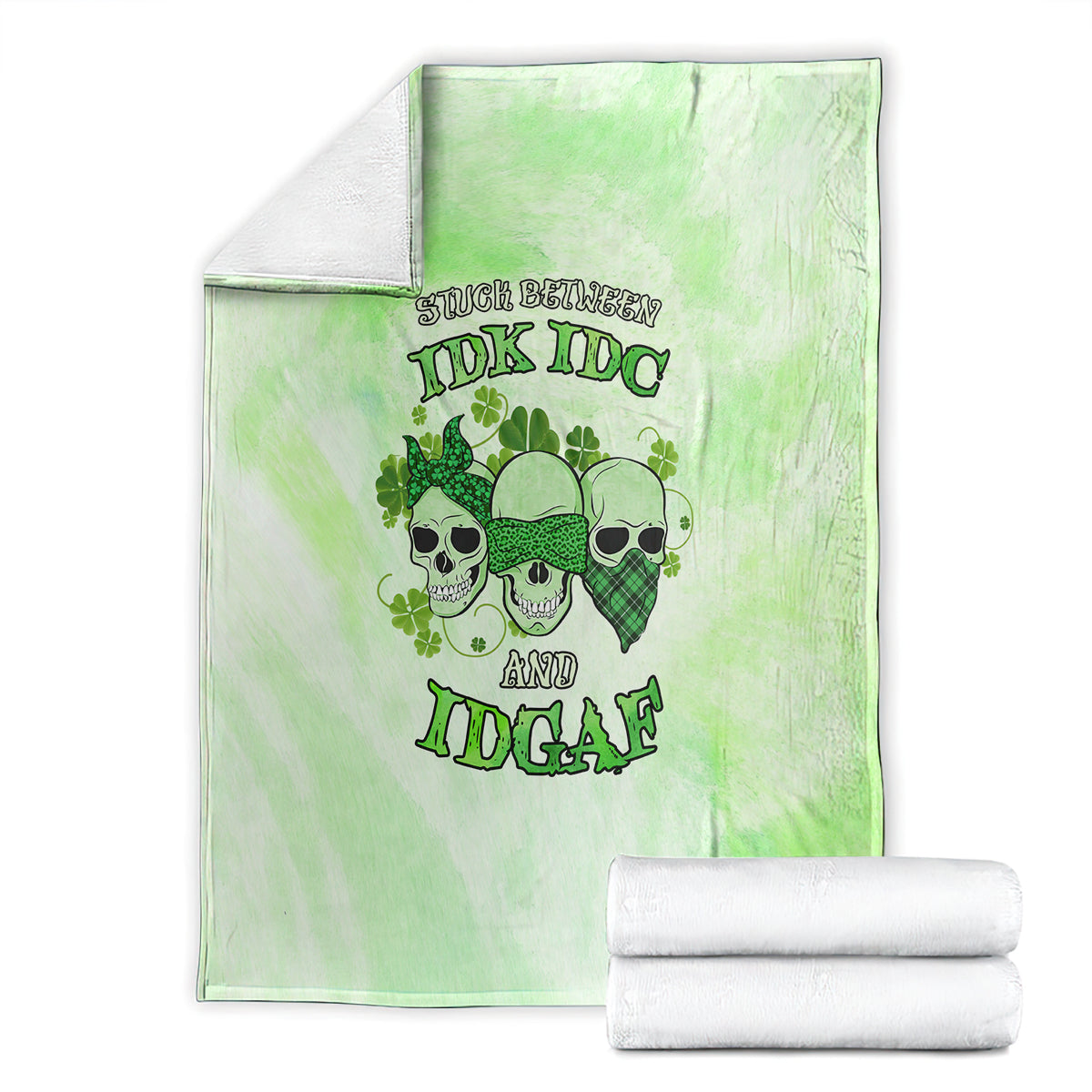 St. Patrick's Day green blanket laid flat, skull faces and shamrock text graphic centered