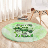 Round green rug with skull-and-clover design and 'IDK IDC AND IDGAF' lettering