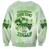 Light green crewneck sweatshirt with green skull-and-clover graphic and stacked text