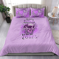 Purple bedding set with skull and rose graphic and 'But not Yours' text on duvet