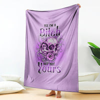 Purple blanket hanging, featuring floral skull art and “YES I'M A Bitch BUT NOT Yours”.