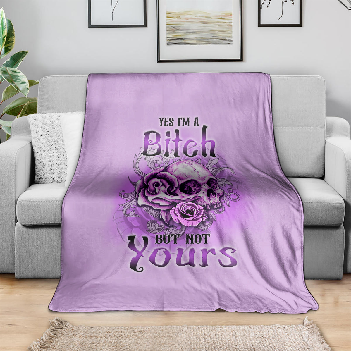 Purple throw blanket with skull, roses, and text “YES I'M A Bitch BUT NOT Yours”.