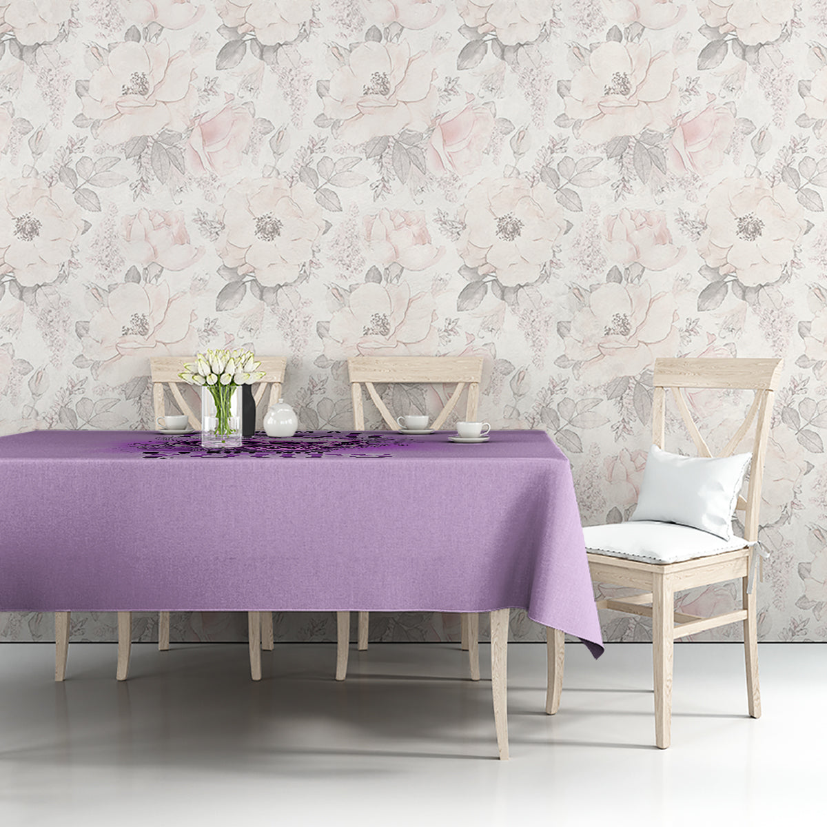 Purple tablecloth on dining table with vase and tea set