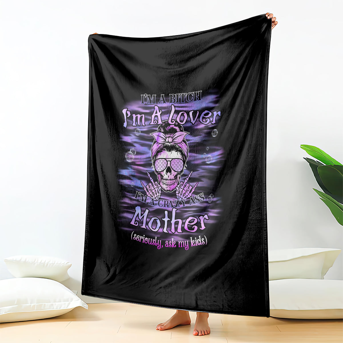 Black throw blanket with purple skull graphic and 'I'm A Lover Mother' lettering