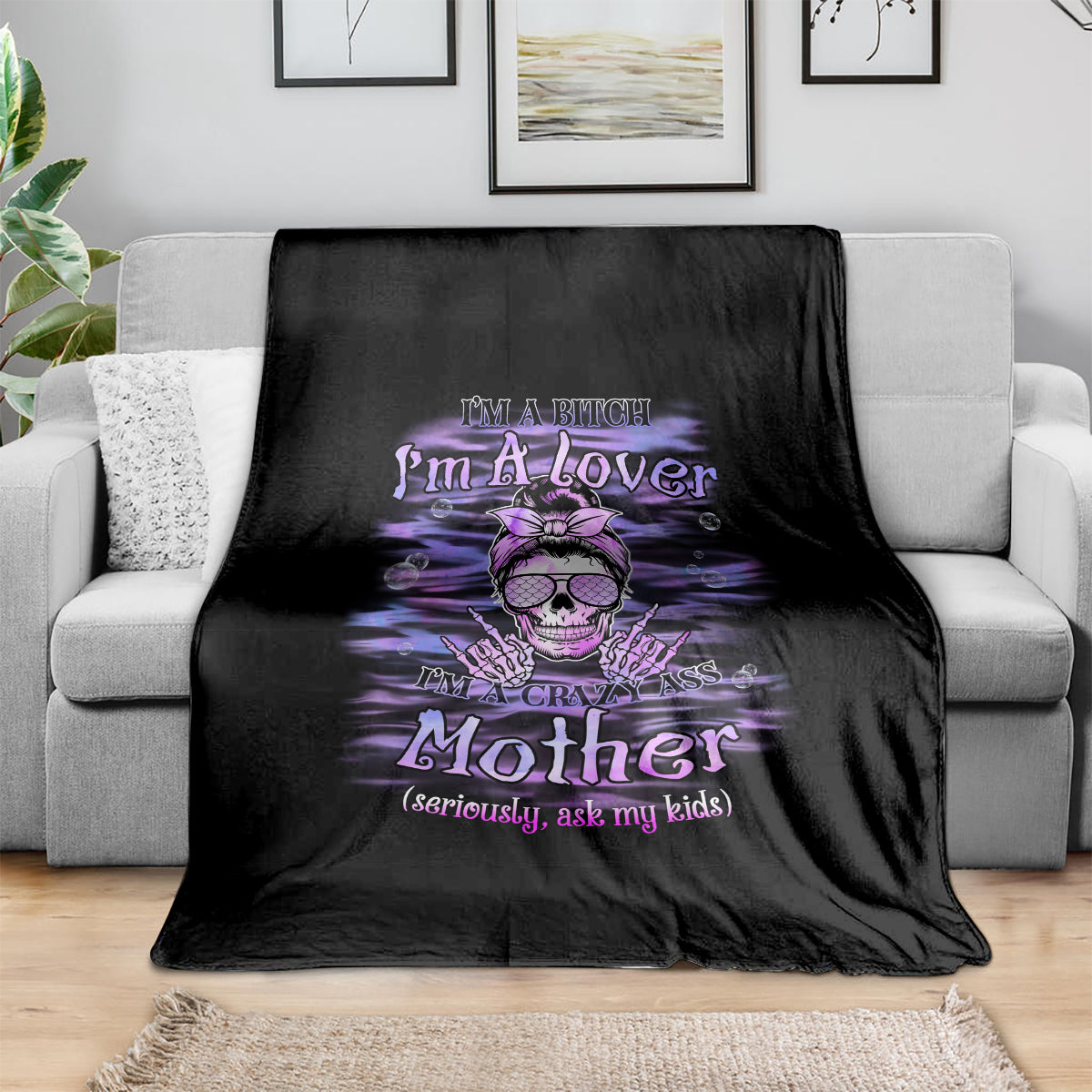 Black throw blanket with purple skull graphic text 'I'm A Lover Mother'