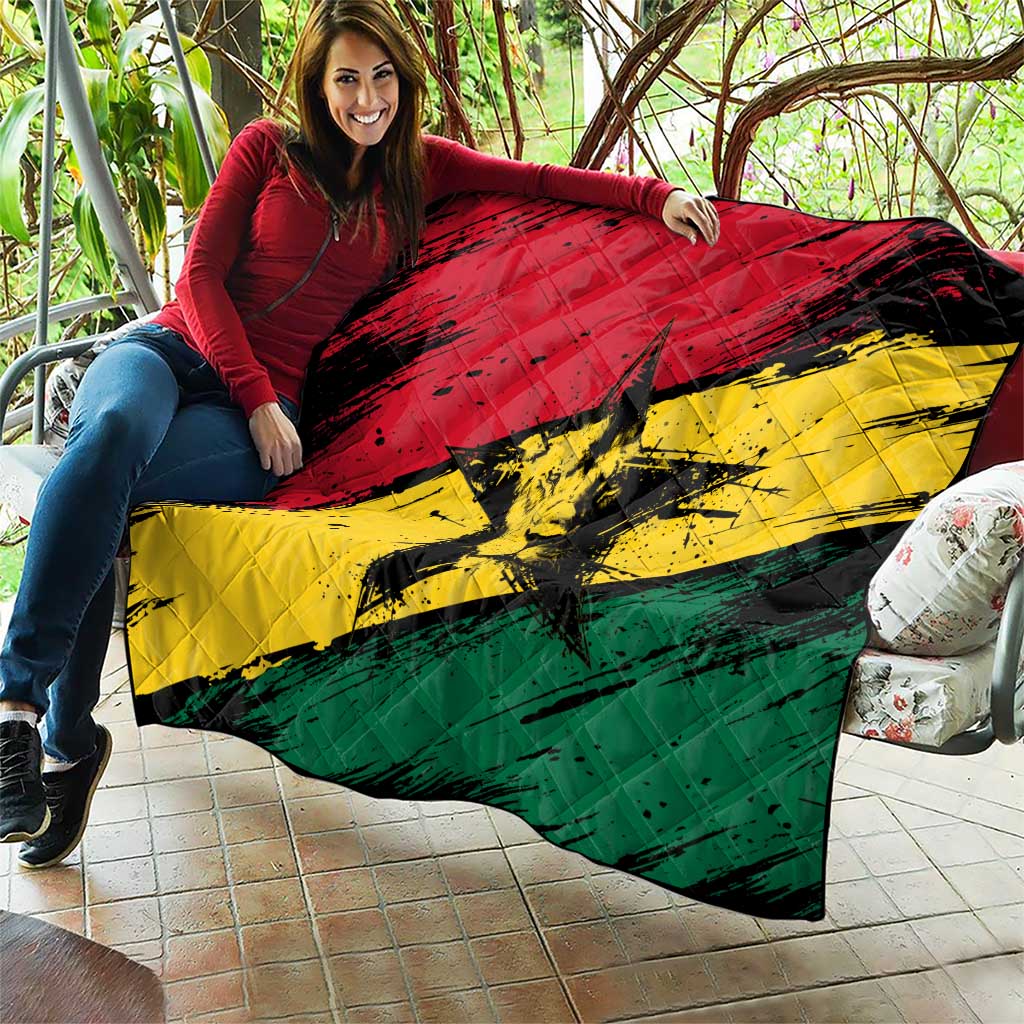 Ghana flag quilt with coat of arms star, large quilt held outdoors in red yellow green