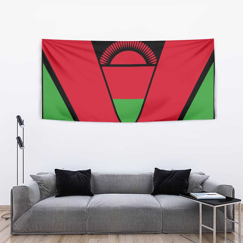 Malawi flag tapestry above couch, red-green flag with central black emblem
