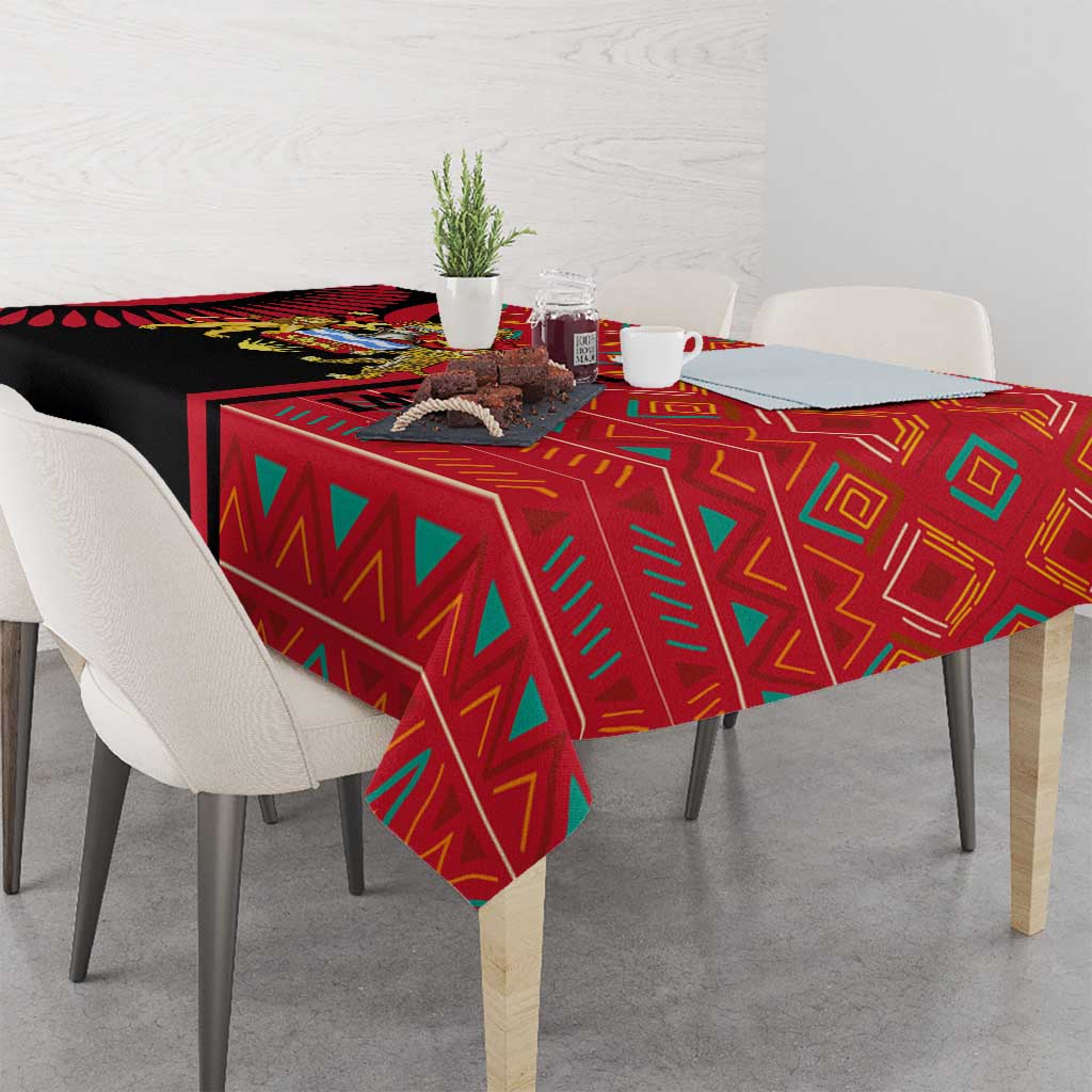 Rectangular tablecloth with red and black geometric design and gold emblem details