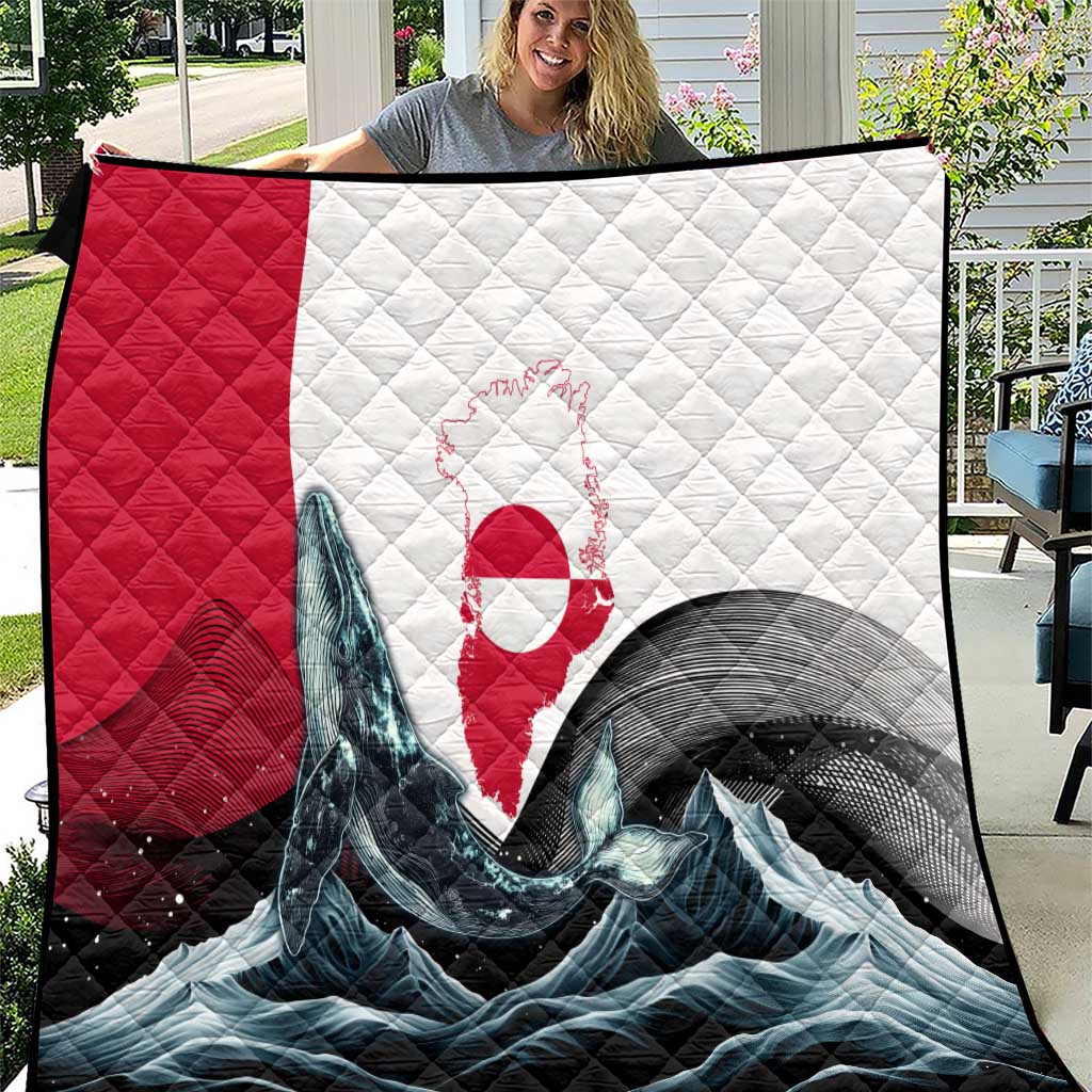 Red, white, and black quilt with quilted diamonds and arctic whale wave graphic