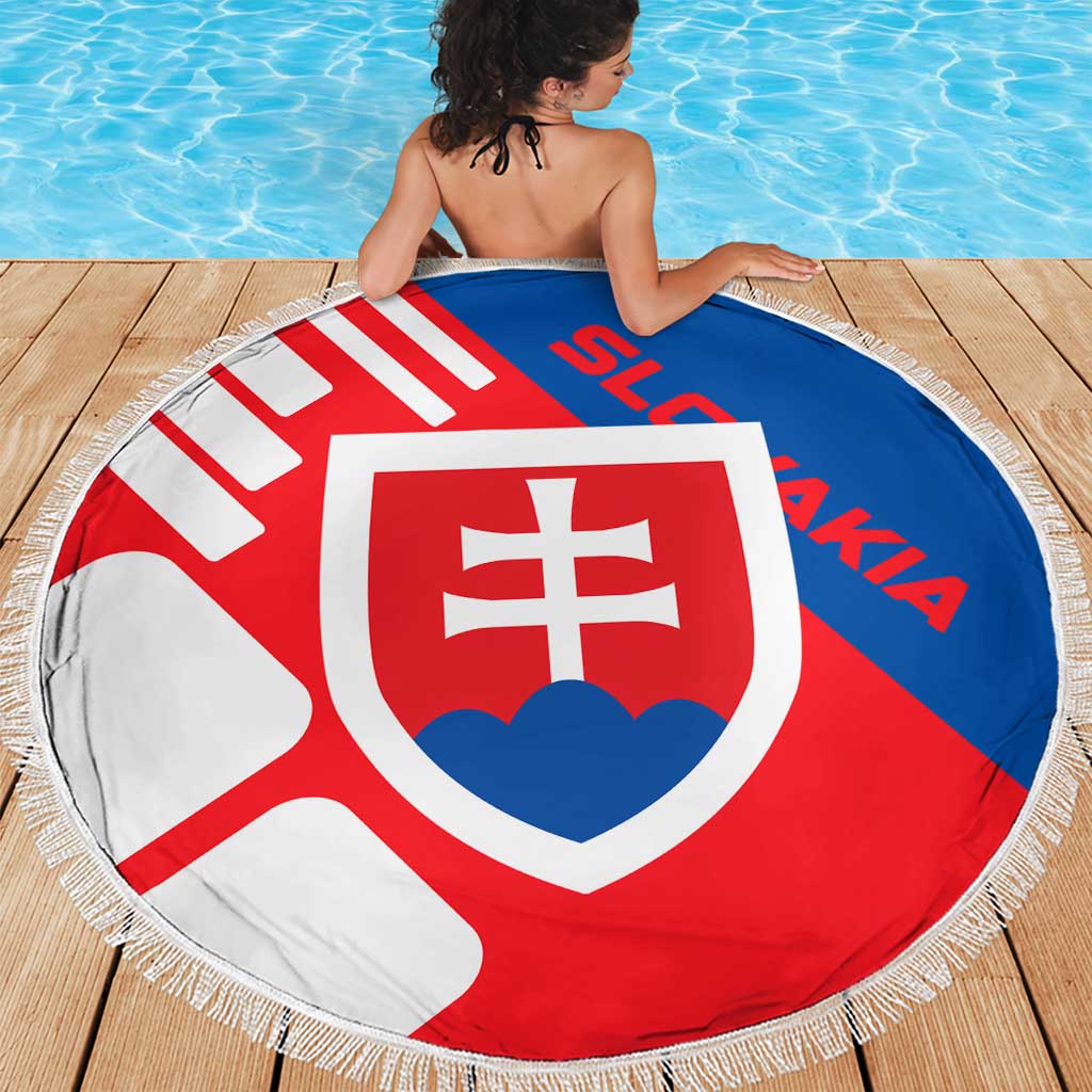 Round Slovakia flag beach blanket with crest print and fringe edge on wooden deck