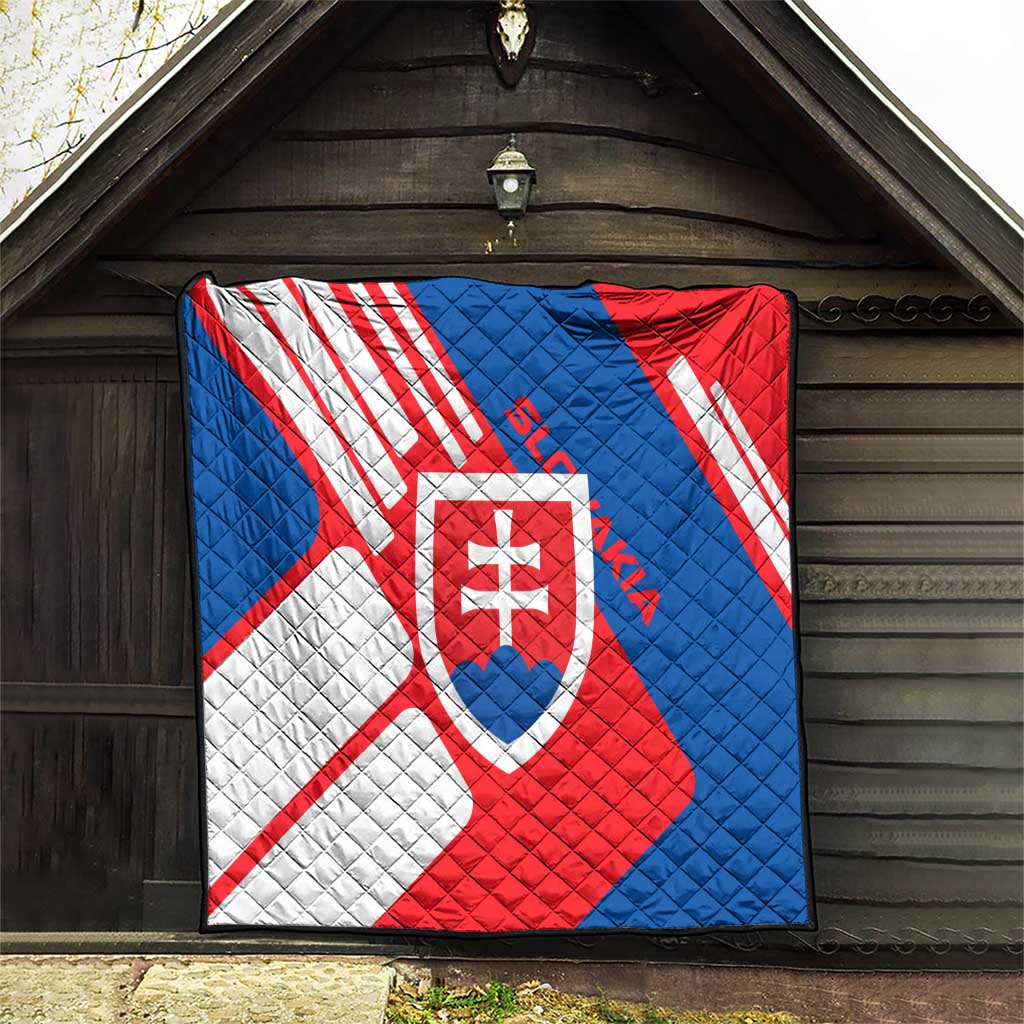 Slovakia flag quilt hanging, quilted red, white, and blue diagonals with central shield crest