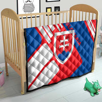 Slovakia flag quilt on baby bed, red, white, and blue diagonals with center shield crest