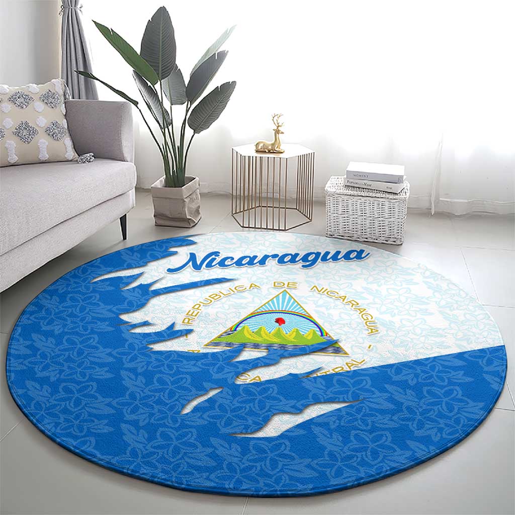 Round carpet featuring Nicaragua wordmark, national emblem, blue and light background