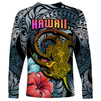 Unisex long sleeve shirt with dark cyan gradient, HAWAII text, turtle emblem, and hibiscus flowers