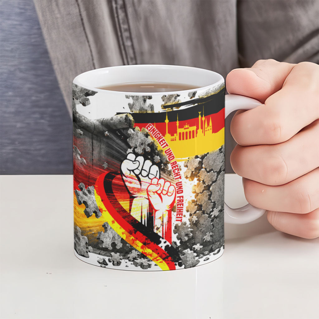 German Unity Day Ceramic Mug Cracked Wall Flag Graphic Unity Fist
