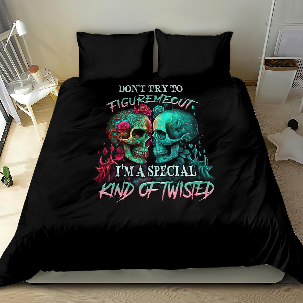 Black bedding set with twin skull graphic and slogan text on duvet, plus two matching pillows