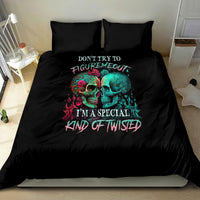 Black bedding set with twin skull graphic and slogan text on duvet, plus two matching pillows