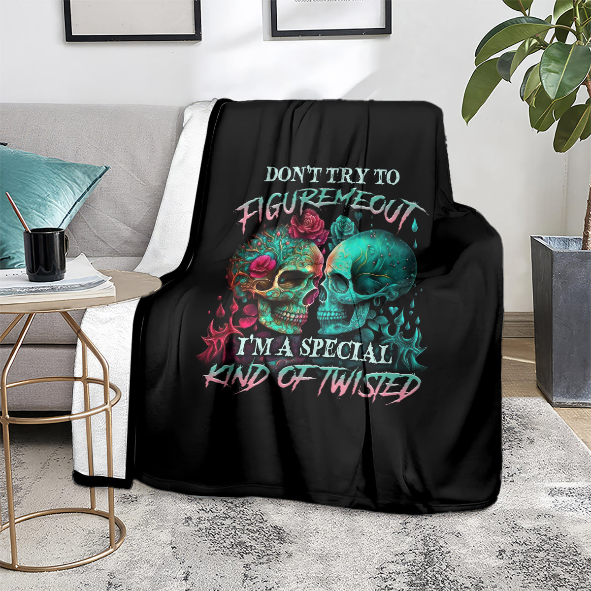 Black skull blanket on living room sofa, multicolor skull faces with 'Special' text