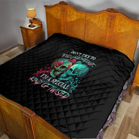 Black quilt with colorful twin skull graphic on bedspread